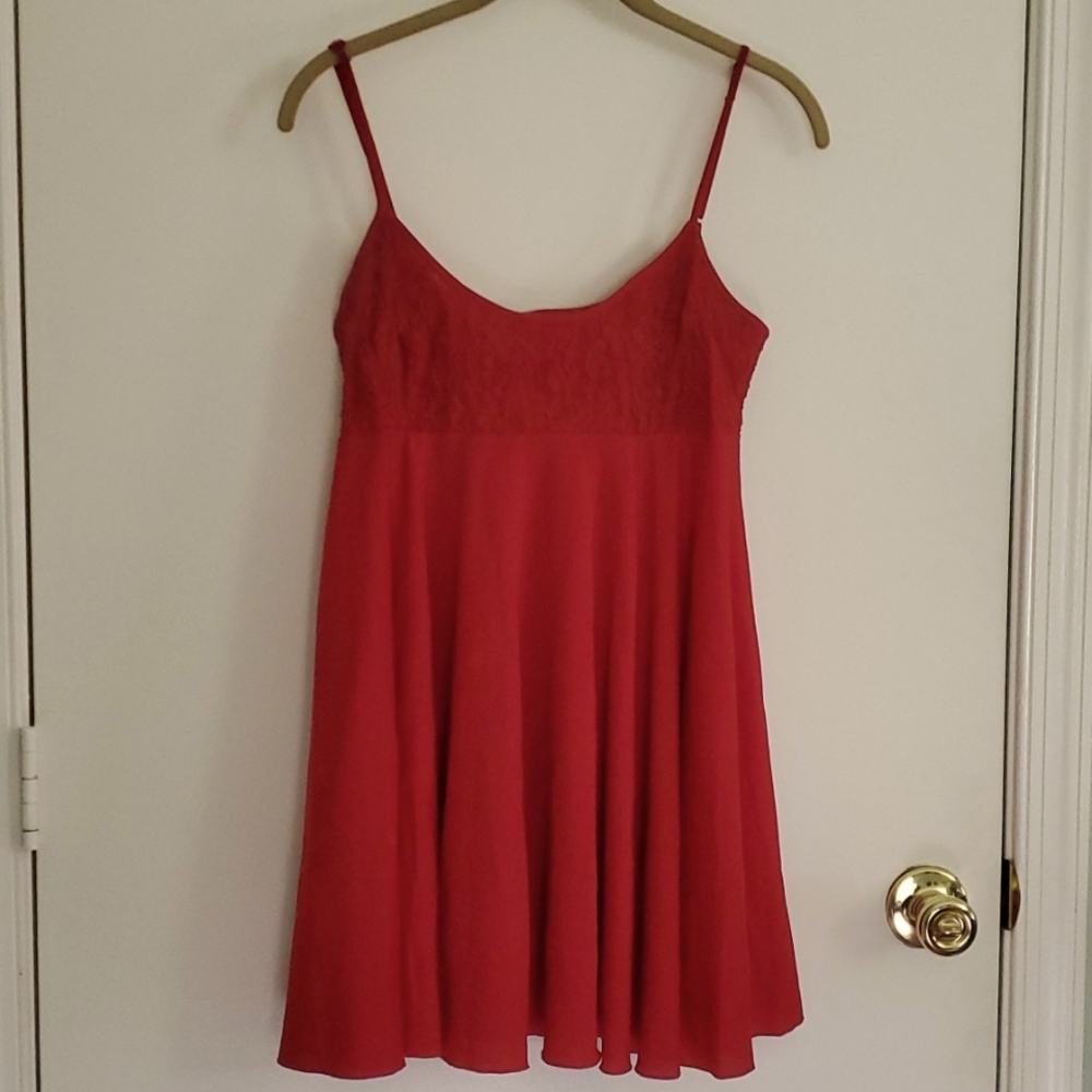 Deep red with lace lingerie. Adjustable straps. Size small